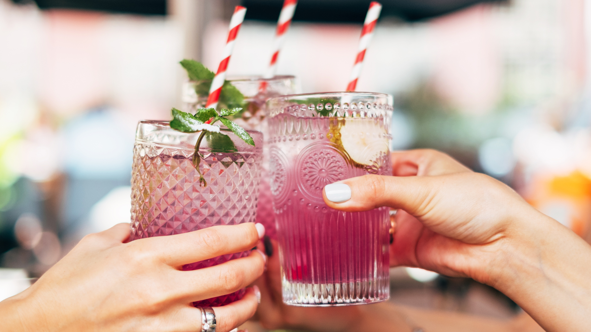 Friends drinking summer cocktails